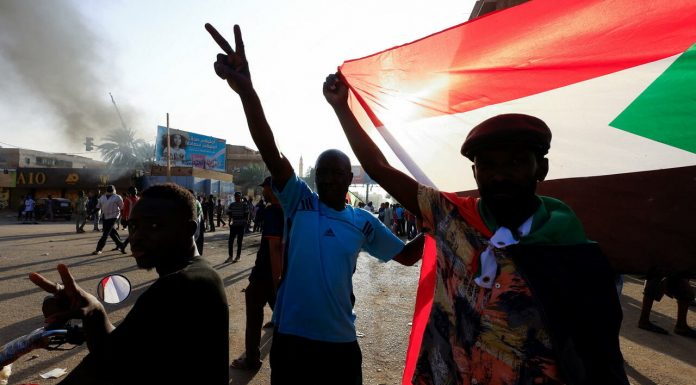 Protester killed in Sudan as thousands rally